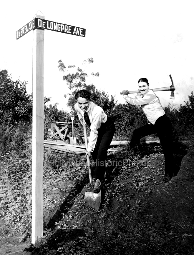 Charlie Chaplin 1918 1 Breaking ground with Sydney WM.jpg